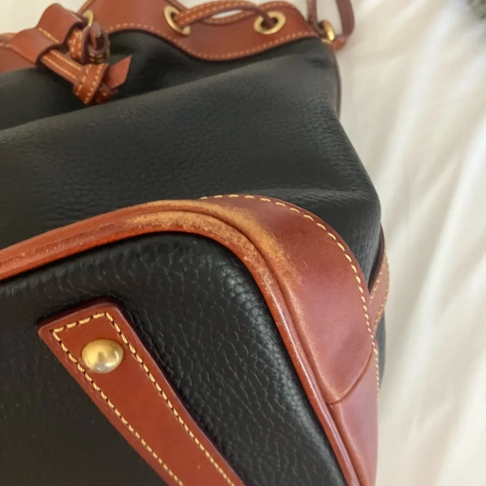 Dooney & Bourke Black and Brown Bucket Bag with Timeless Elegance - Picture 5 of 11